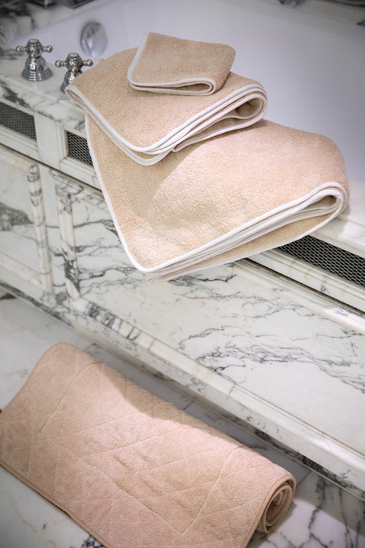 Serviette beige avec passpoil